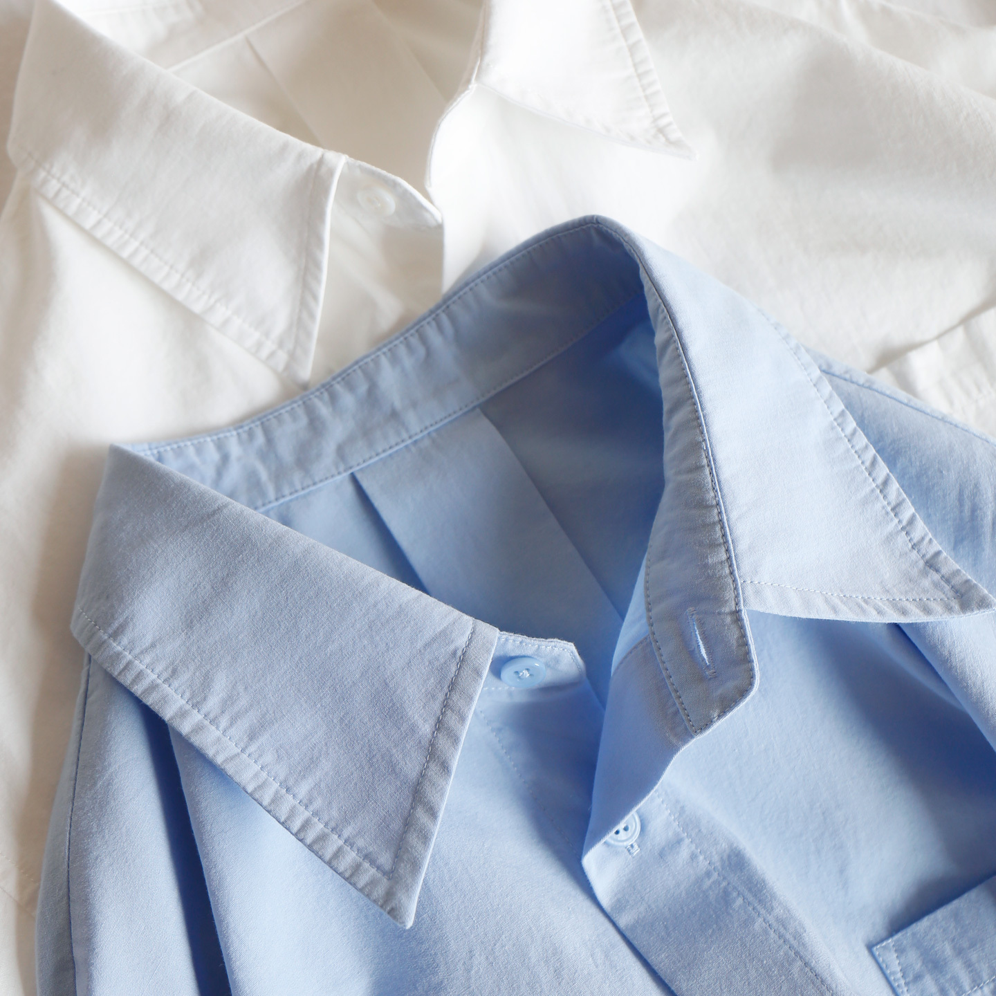 法柜精简通勤纯棉宽松圆弧摆衬衫