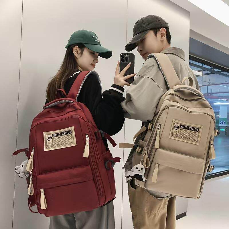新款书包防水中学生大容量纯色双肩包女高中生牛津布背包休闲百搭