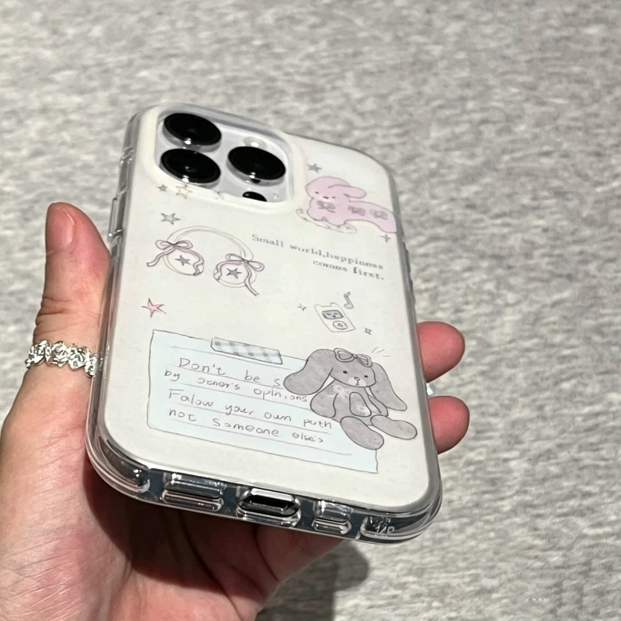 适用苹果系列iPhone17新款手机壳16promax/14pro小众磨砂耳机兔子15promax/13pro半包大孔防摔可爱女款保护套