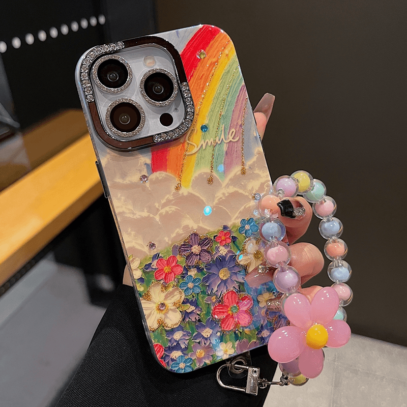 适用苹果系列iPhone15网红手机壳14plus/15plus高级小众ins风彩虹花海蓝光滴胶半钻镜框手链防摔新款保护套