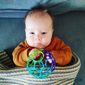 包邮婴儿手抓球牙胶手摇软球幼儿感统训练玩具宝宝可啃咬洞洞球0+