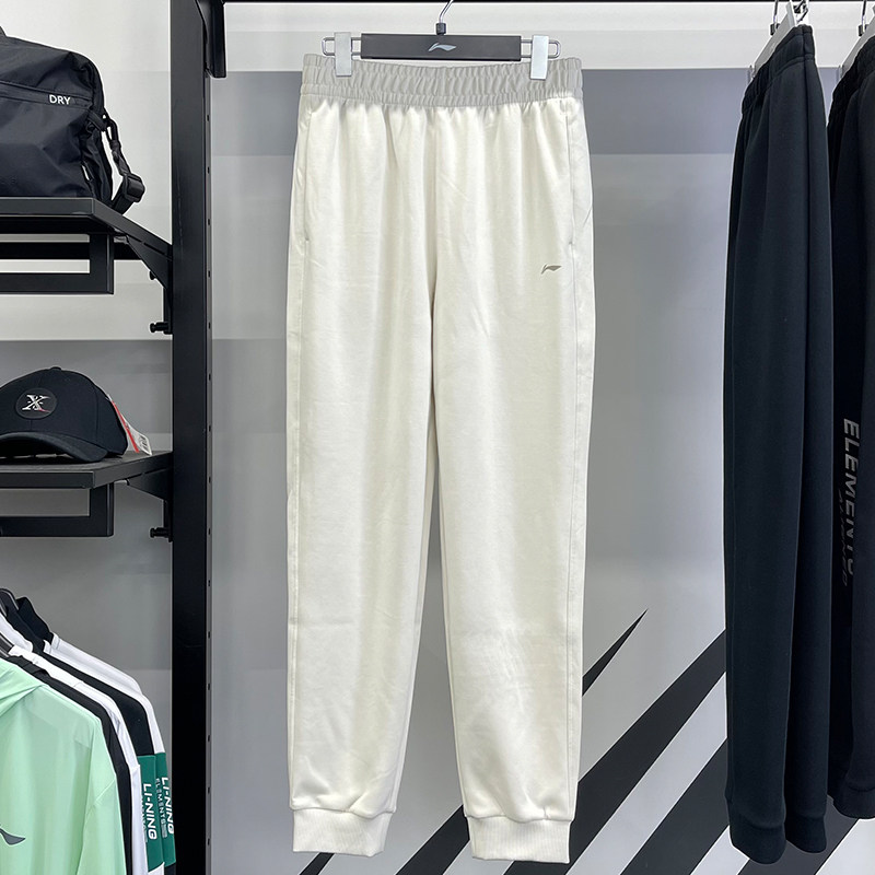 李宁女子卫裤2025春季新款健身时尚束脚针织宽松运动长裤AKLV032