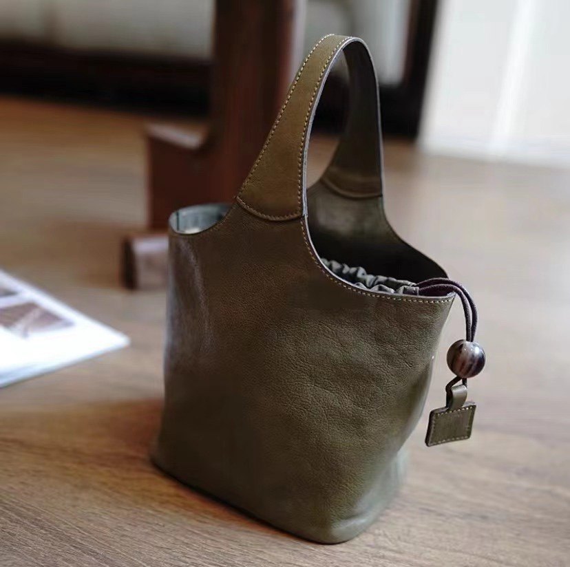 头层牛皮水桶包手提包时尚休闲纯色手提包,箱包皮具/热销女包/男包,水桶包,淘宝优惠券,粉丝福利购,淘宝优惠卷