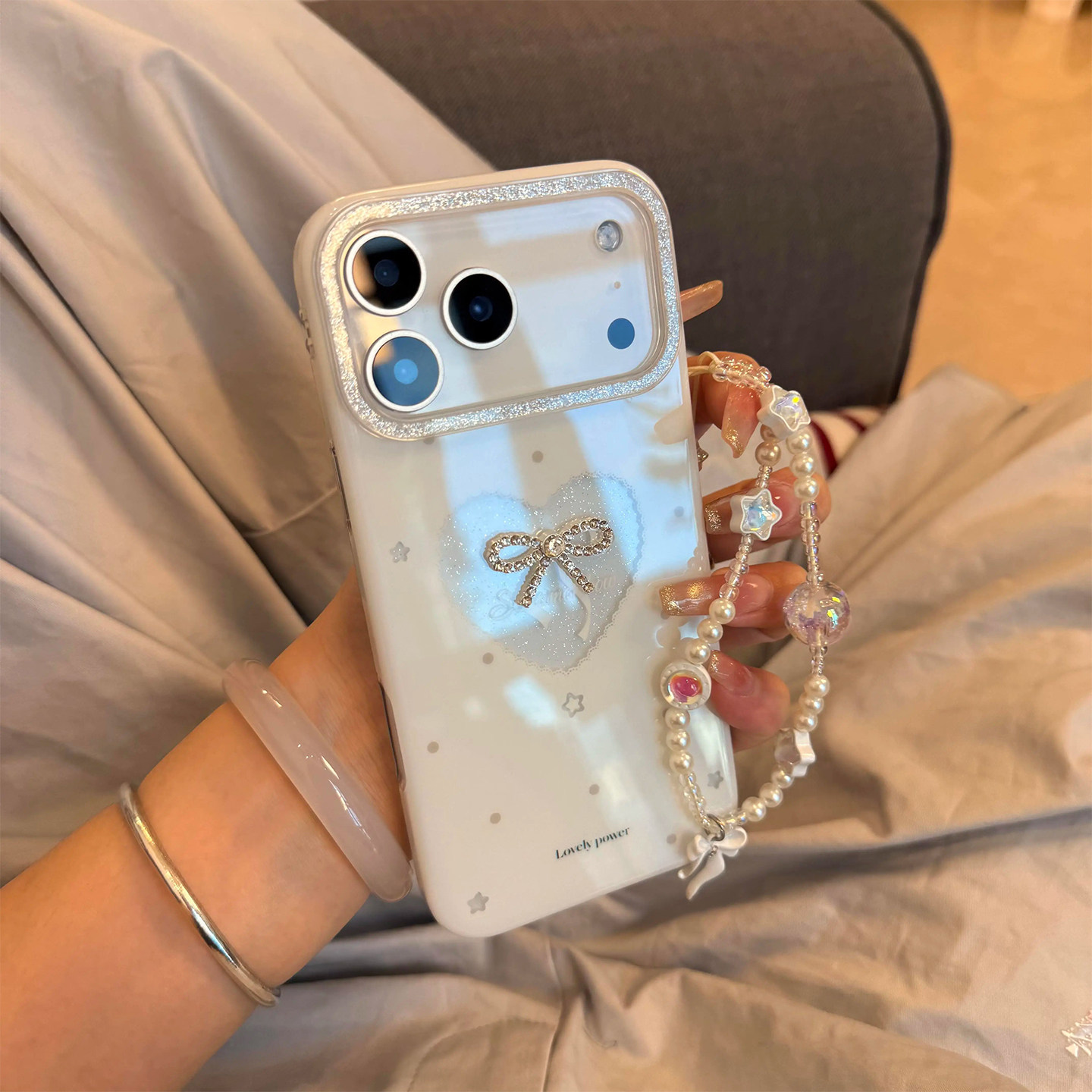 闪粉镂空爱心蝴蝶结适用苹果17promax手机壳新款iphone