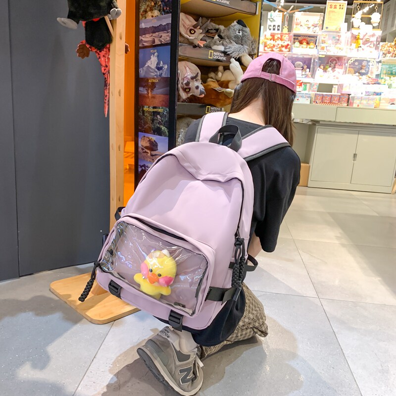 清仓跳楼大容量双肩包可透视前兜学院风背包休闲包包