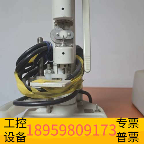 华创设备Bausch & Lomb眼镜打孔机，白色机身，带CE认证。