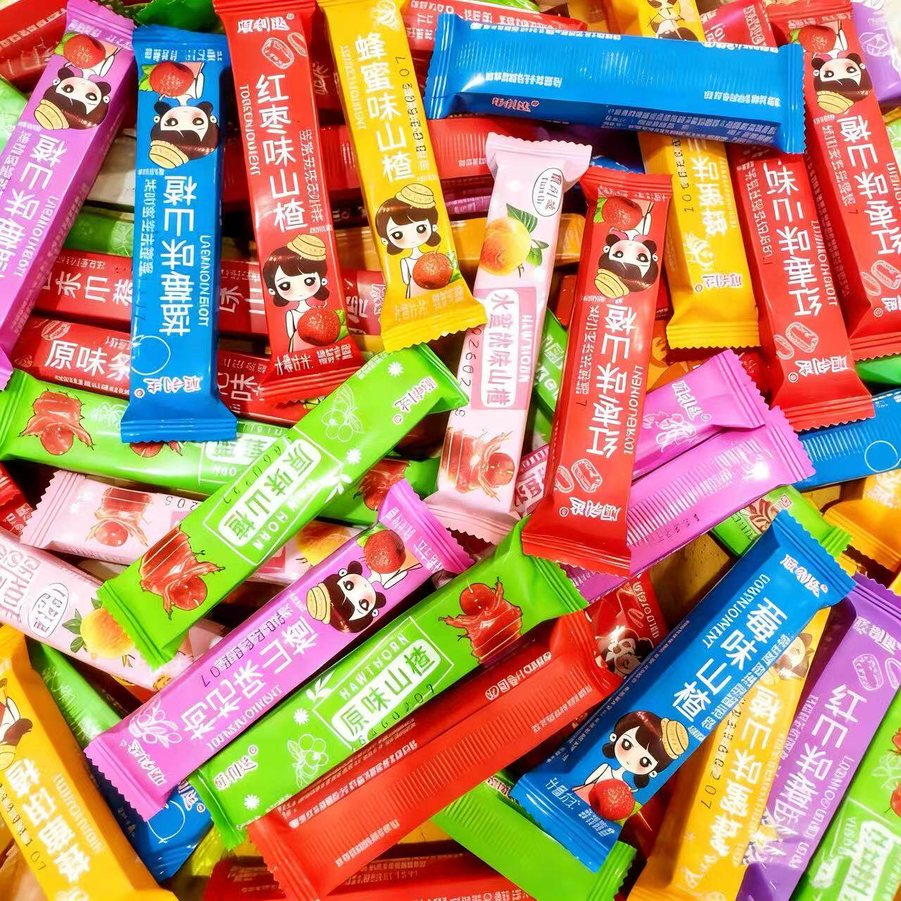 山楂果条酸甜山楂条果丹皮多口味水果味小包装零食散装整箱批发