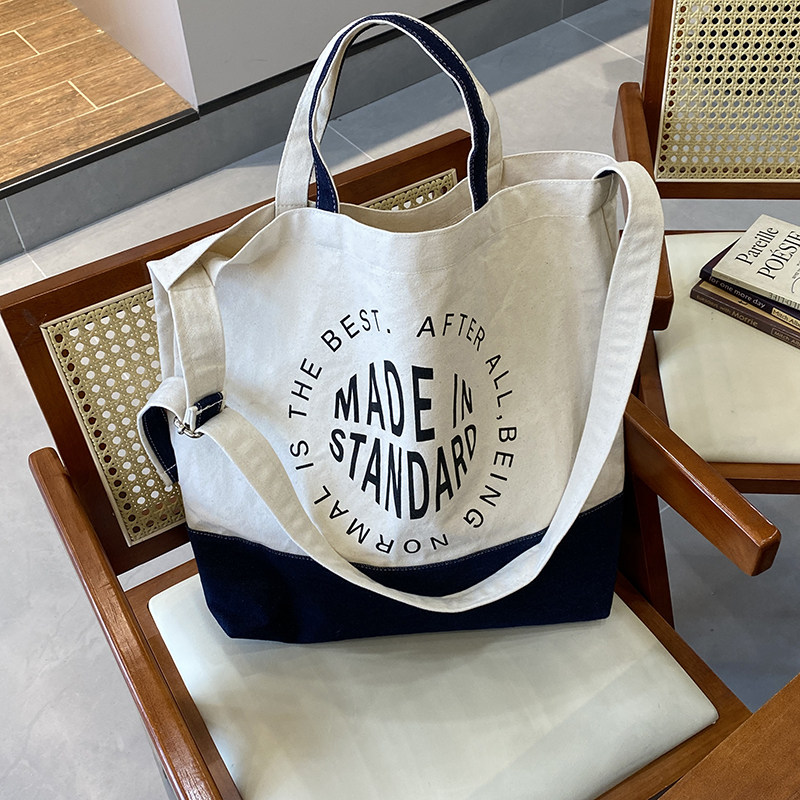 唐糖包袋学院风帆布袋蓝色斜纹棉布拼接帆布包撞色ins韩风手提包