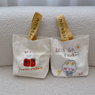 新款呆萌兔兔手拎包女便携式帆布袋通勤妈咪包学生便当包收纳包