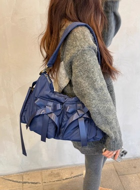 casselini日系小众2025超火多口袋蝴蝶结单肩斜挎包女大容量包包