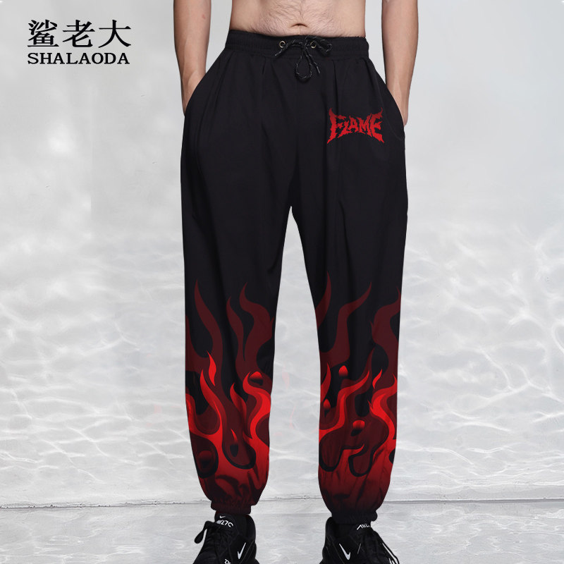 潮牌九分裤男聚酯纤维长裤火焰印花春夏新款束脚裤子休闲裤哈伦裤