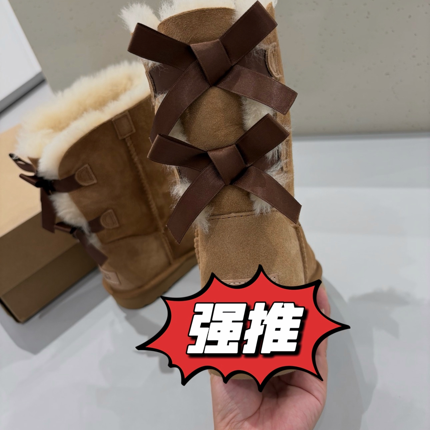 皮毛一体三粒扣高筒雪地靴女款
