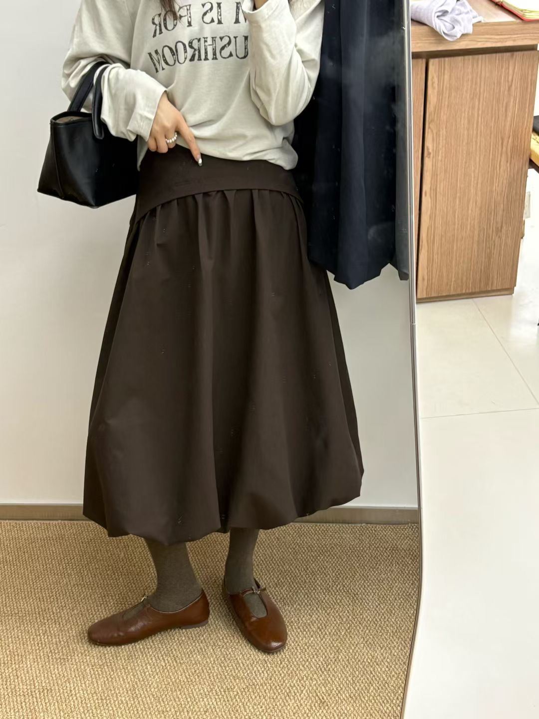 衣语慧法式设计感半身裙女秋季新款松紧腰不规则字裙百褶花苞裙