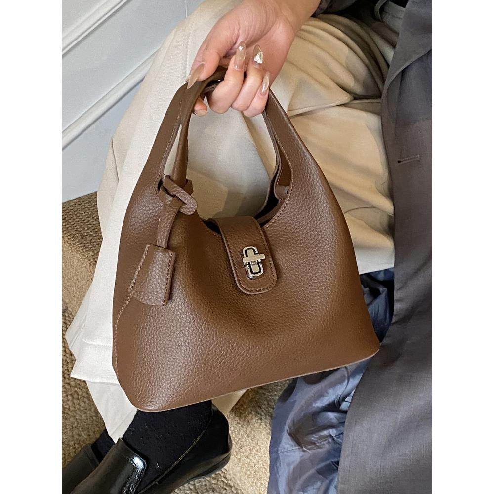 韩版复古手提水桶包女2025冬季新款日常休闲单肩包小众通勤斜挎包,箱包皮具/热销女包/男包,水桶包,淘宝优惠券,粉丝福利购,淘宝优惠卷