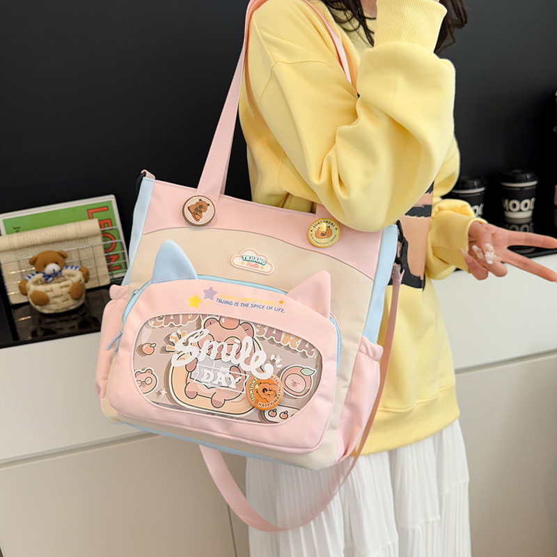 初中学生斜挎包女孩卡通手提拎书袋ins时尚单肩包透明痛包补习袋