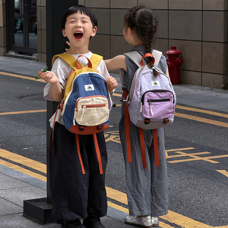 儿童双肩包潮流撞色韩版轻便男孩女童幼儿园书包女休闲时尚小背包