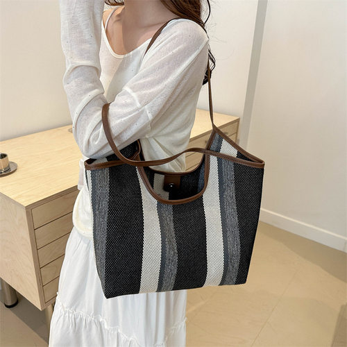 韩系大容量女士单肩包新款格纹复古撞色手提包简约通勤百搭斜挎包