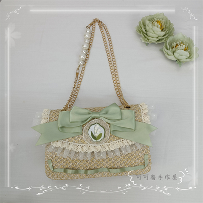 taobao agent Genuine design shoulder bag, woven handheld one-shoulder bag, fresh mint small bag, Lolita style