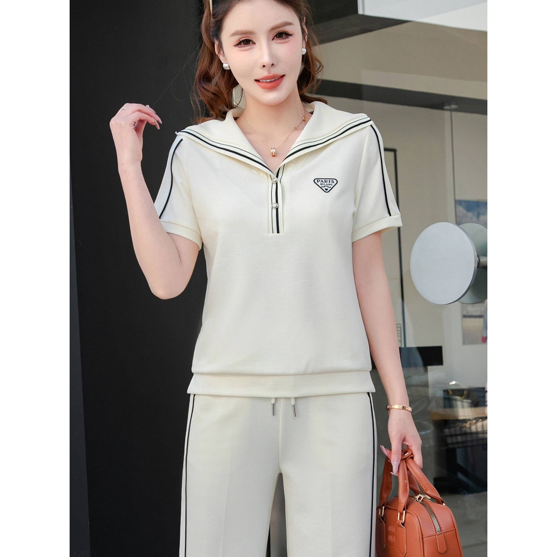 专柜品牌时尚休闲运动套装女2026夏季新款短袖连帽显瘦阔腿裤两件