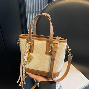 小C&K流行手提包包女士2025新款潮撞色单肩包高级感斜挎水桶