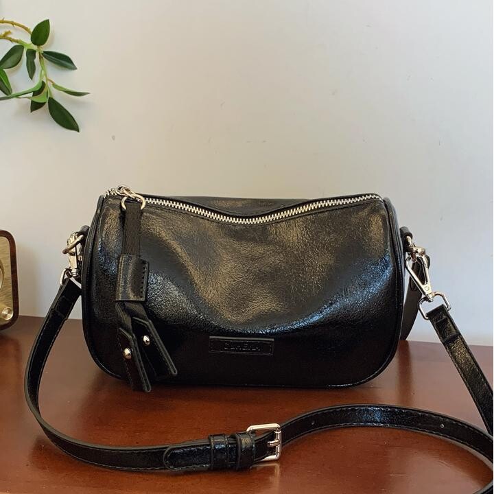 小C&K复古潮流饺子包2025新款简约波士顿包高级质感单肩斜挎