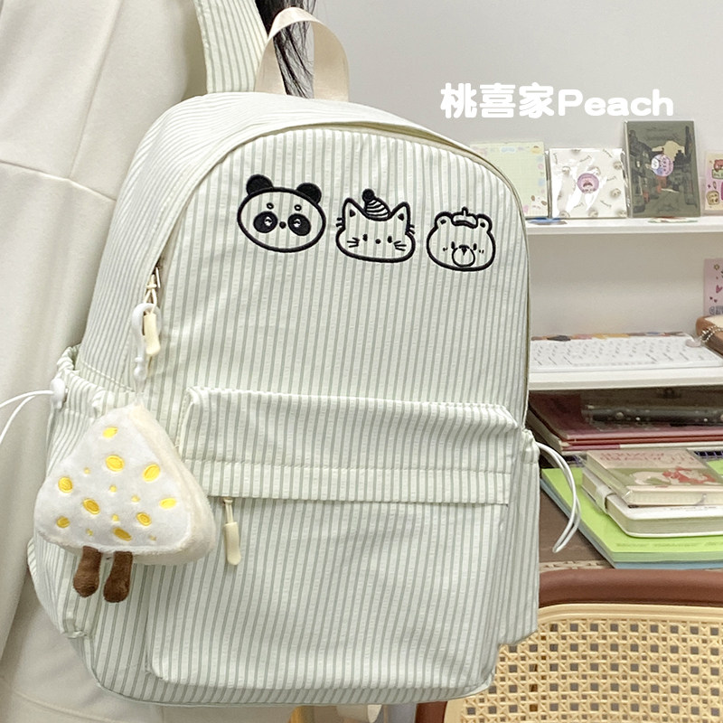 日系可爱卡通条纹双肩包女小学生初中生书包女轻便大容量旅游背包