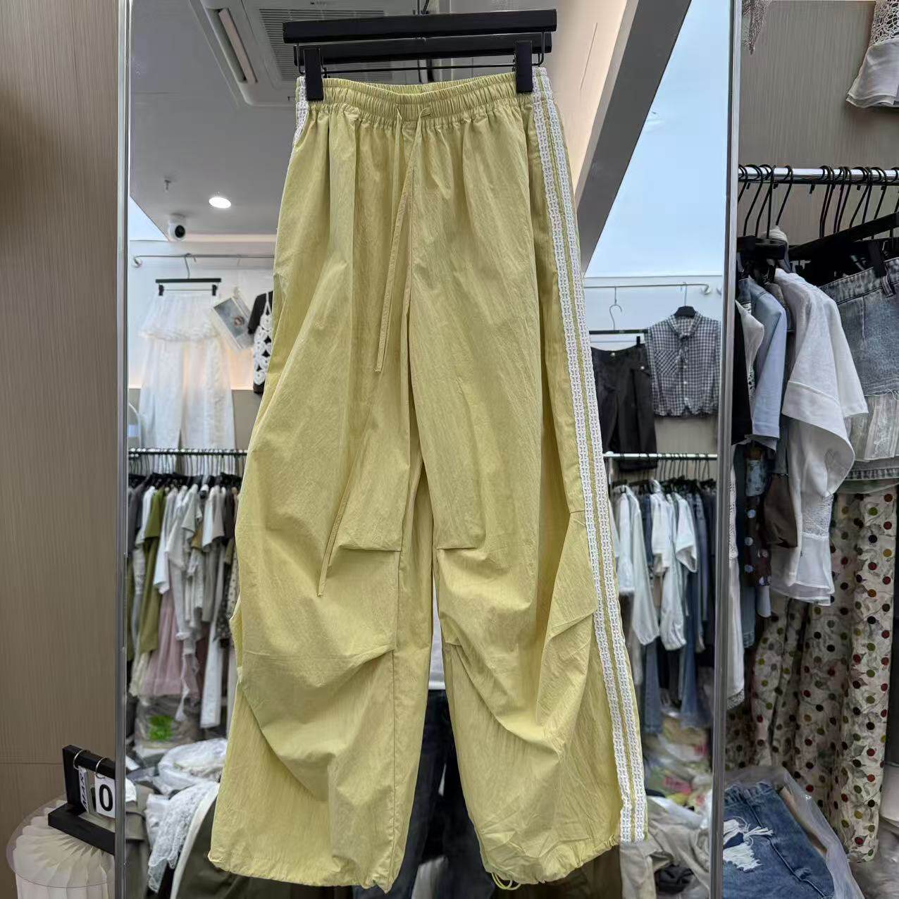 欧洲站2026夏季新款欧货时尚松紧腰侧边蕾丝条休闲运动裤女93426
