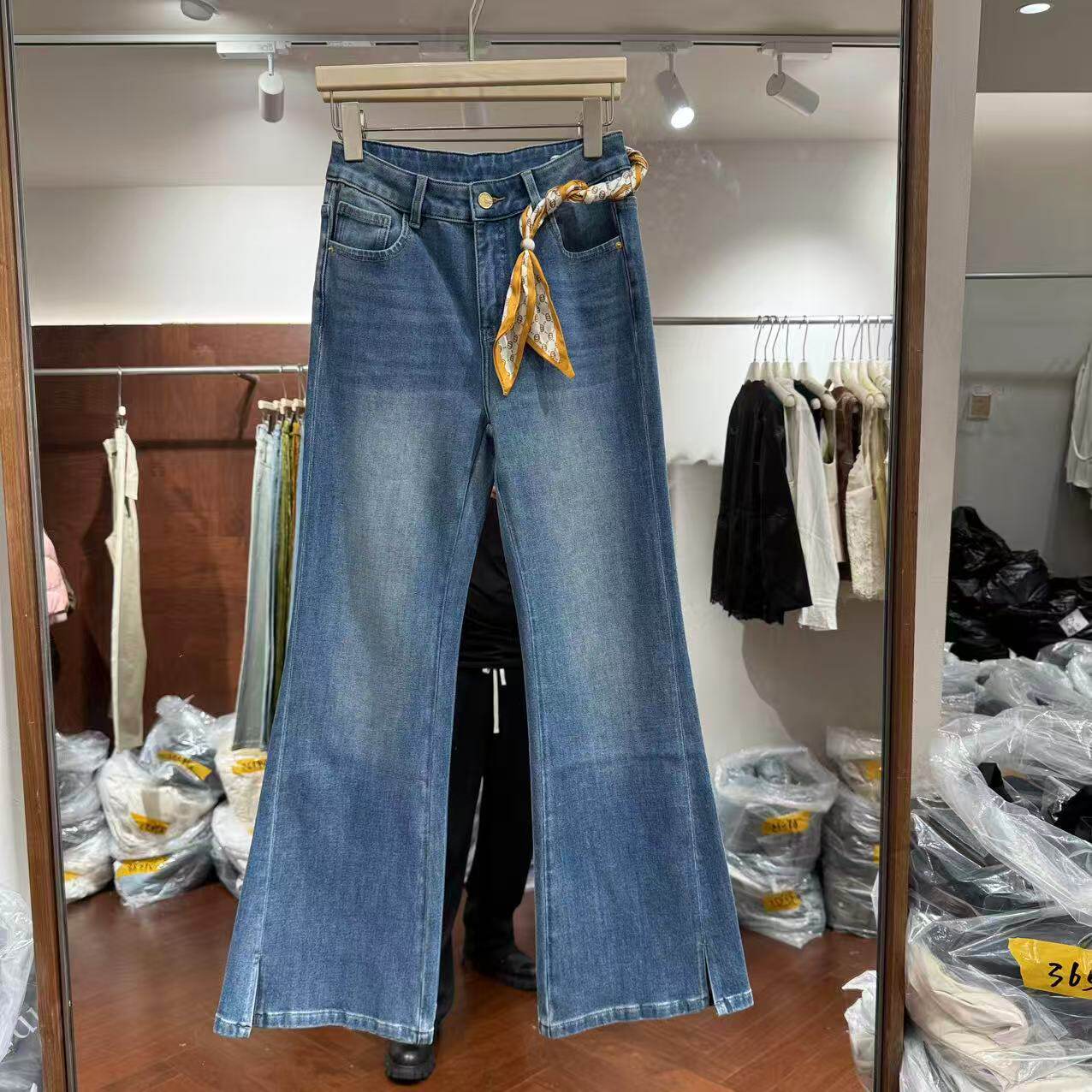 欧洲站2026春新款欧货印花腰带裤脚开叉微喇显瘦百搭牛仔裤32327