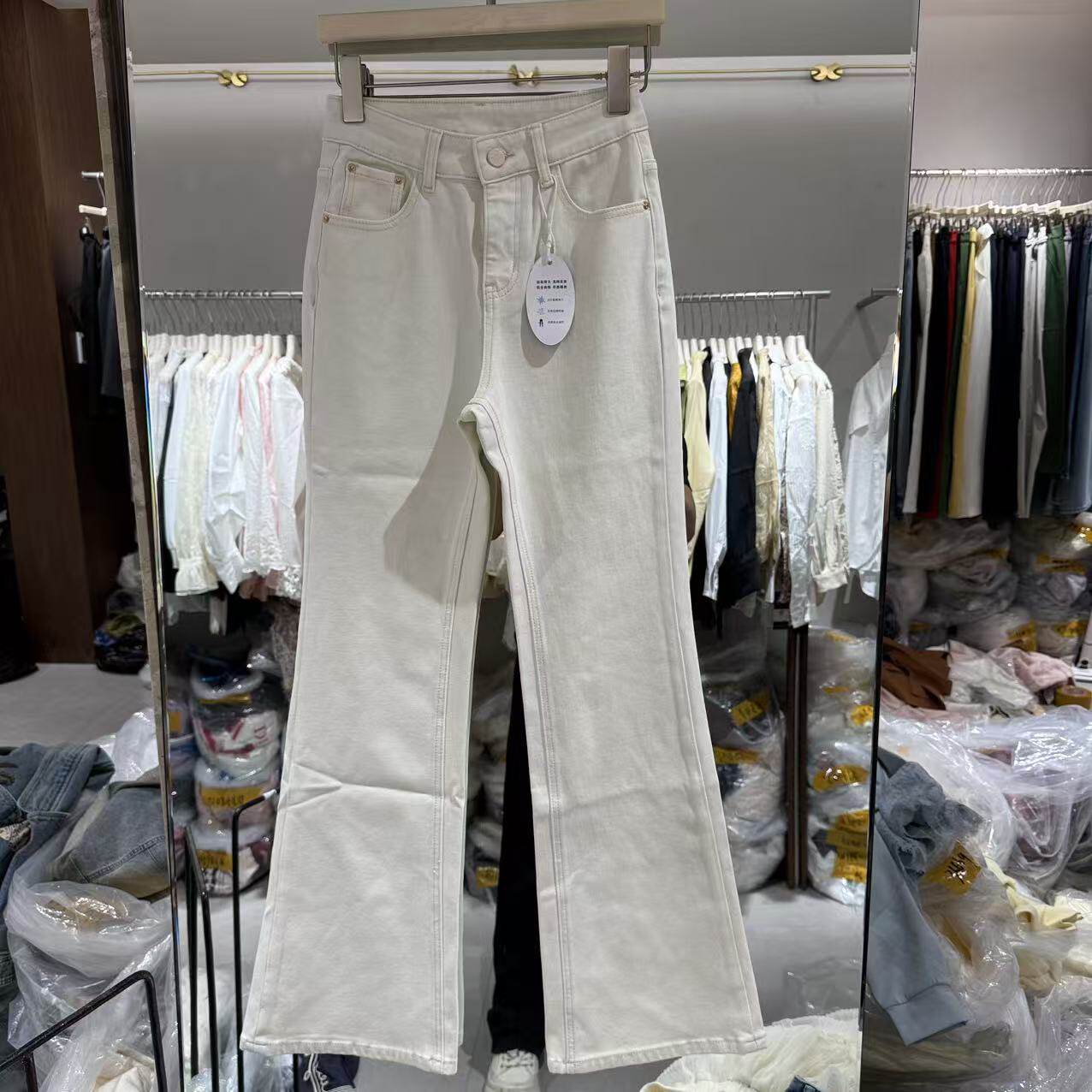 欧洲站2026春季新款欧货显瘦后翻盖口袋百搭微喇牛仔裤女潮36808