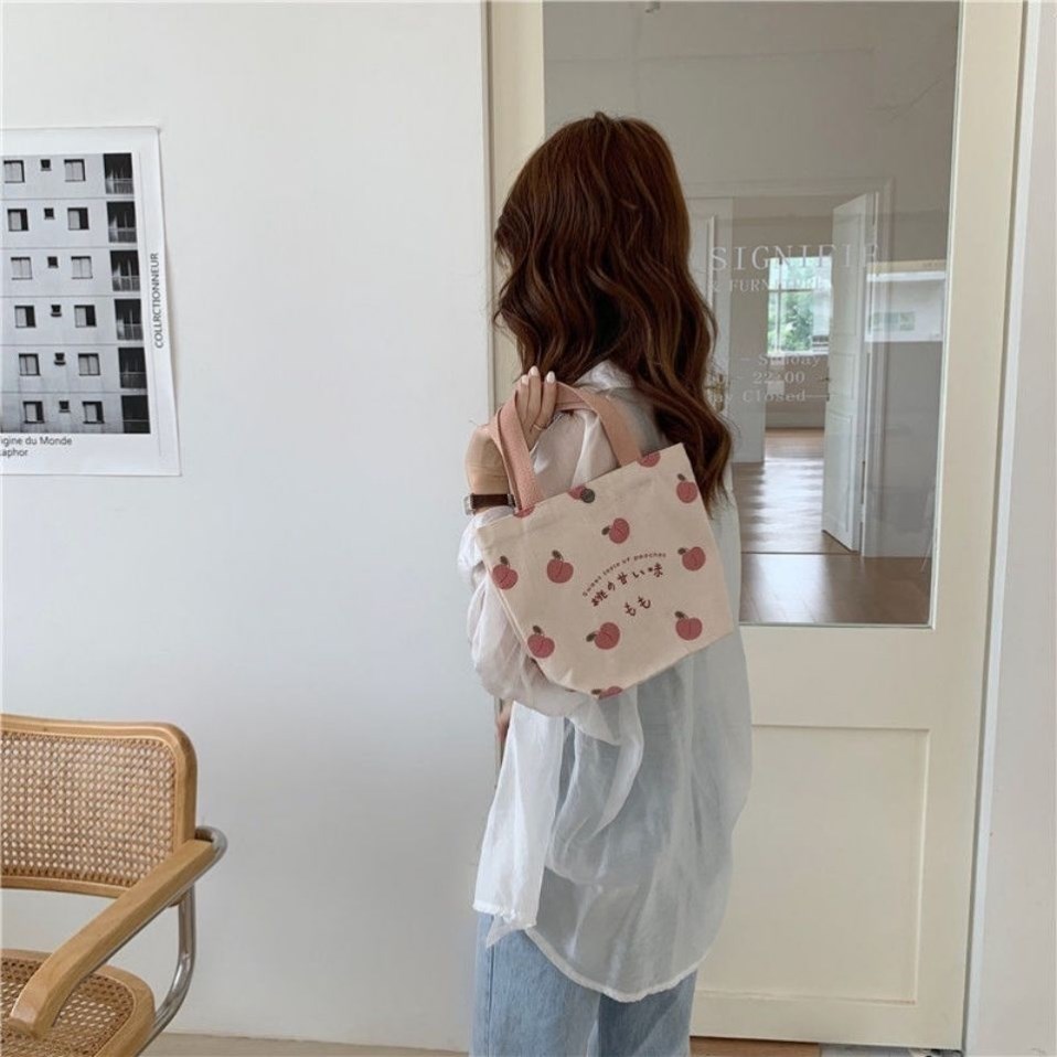 小布包手机包手提女韩版帆布包外出逛街小手提包简约百搭手拎包便