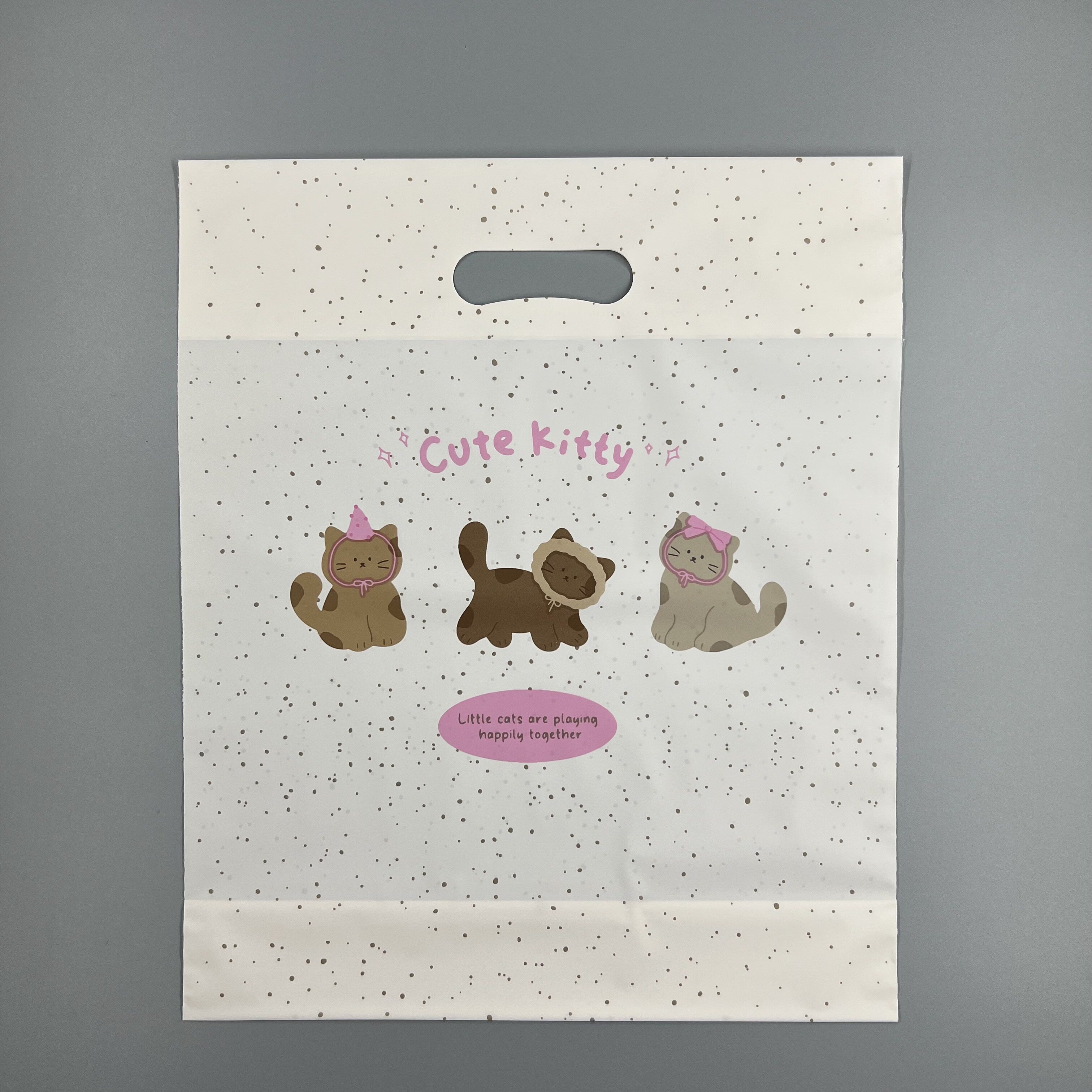 斑点小猫咪手提袋奶油黄色塑料挖孔袋加厚迷你袋子饰品内衣化妆品