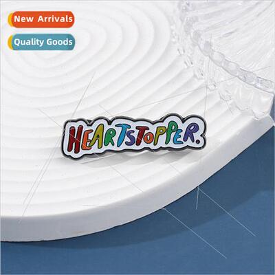 Commemorative metal badges around the British drama Heartsto