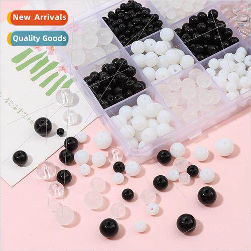 Hundreds of transparent black and white glass beads loose be
