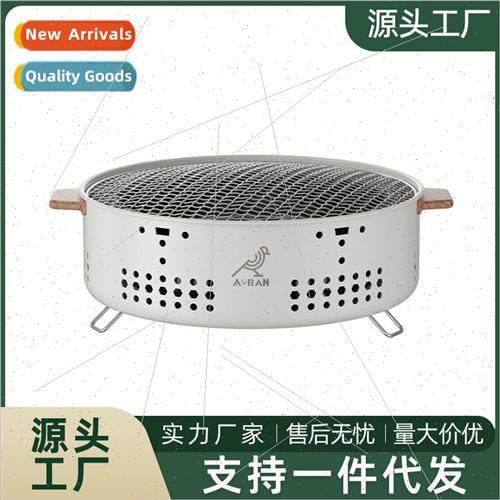 Outdoor camping barbecue grill around the stove to cook tea