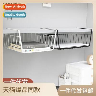 Dorm room desk under hanging basket college student dormory