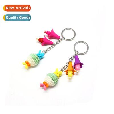 Creative two-color pearl ball trumpet flower keychain pendan
