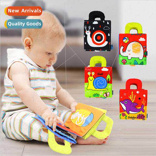 Montessori Early Learning cloth book bed surrounded by baby