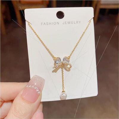Fashion niche delicate zirconia bow dangling pearl necklace