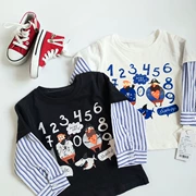 2019 quần áo trẻ em mùa thu đông mới cho bé trai ngoại quốc giả hai mảnh áo thun sọc cotton dễ thương bé sơ mi mùa thu áo thủy triều - Áo thun