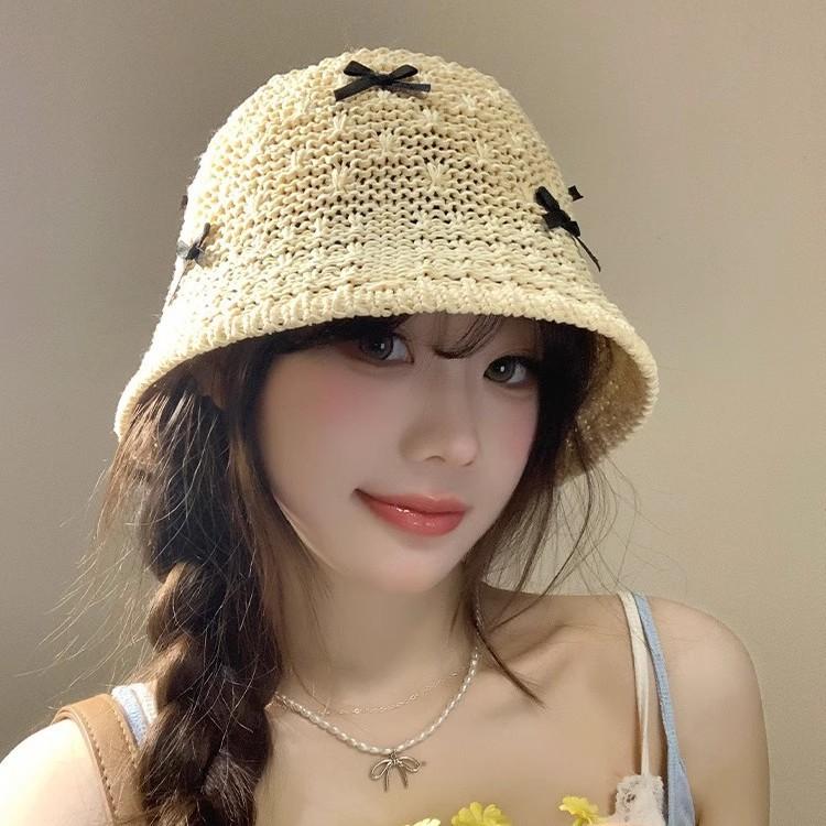 甜美蝴蝶结手工编织渔夫帽子女夏季镂空透气海边遮阳防紫外线盆帽