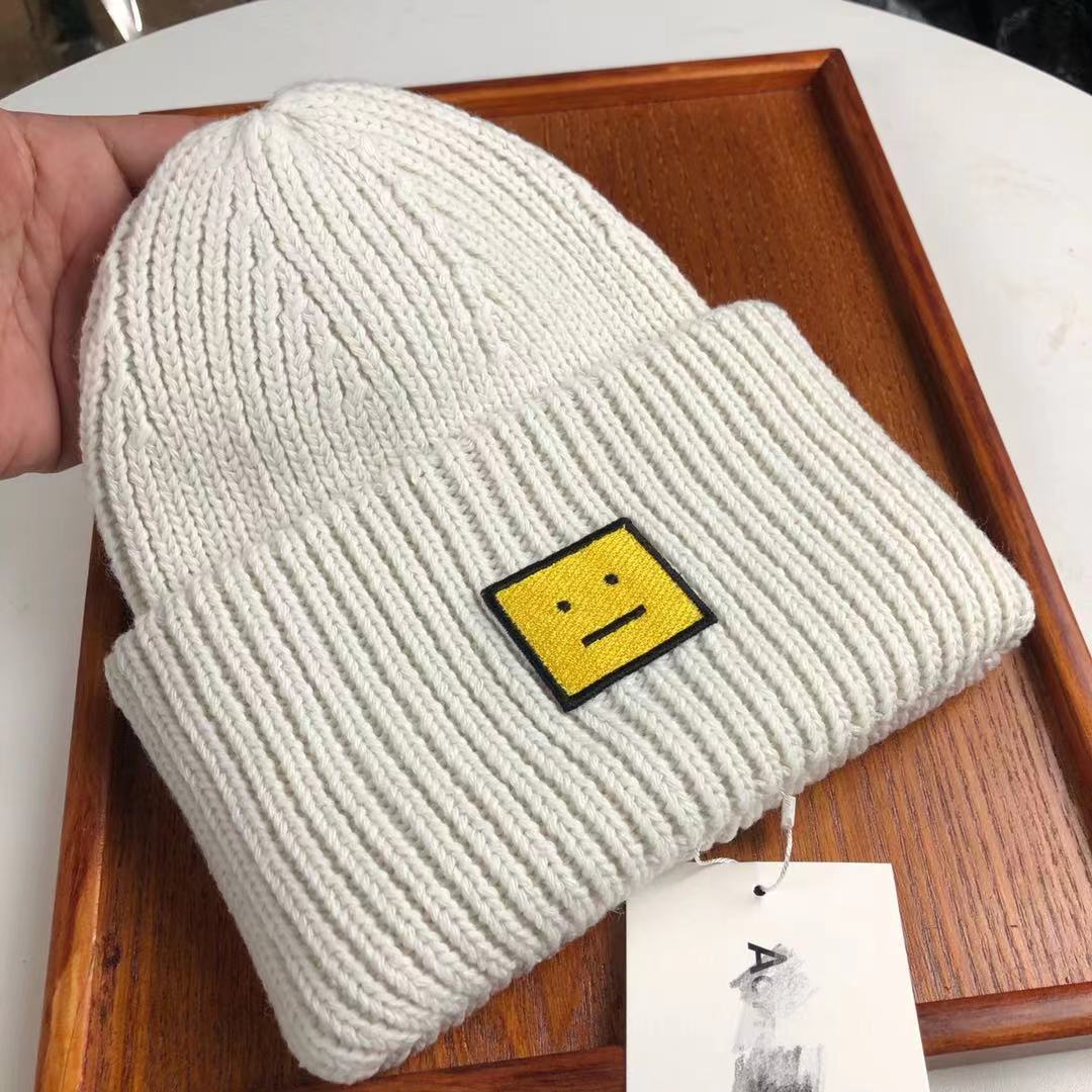名牌AC针织羊毛笑脸帽方块贴标冷帽保暖针织情侣毛线帽