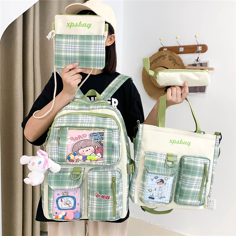 格子书包女小学生清新可爱初中生校园大容量双肩包三到六年级背包