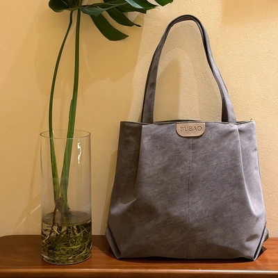 时尚大容量单肩手提女包通勤