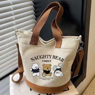 卡通简约风手提妈咪包水桶包单肩印花少女风日系斜挎包手提款休闲