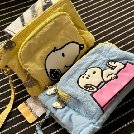 可爱史努比流行款奶黄色小手提包卡通少女化妆包收纳包单肩斜挎包