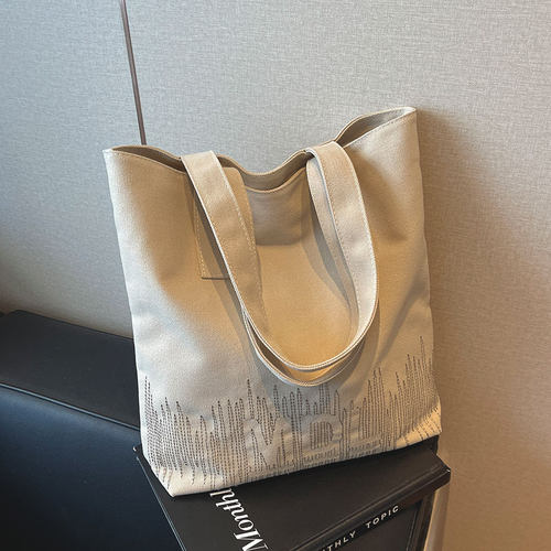 菇八八简约通勤帆布包包女