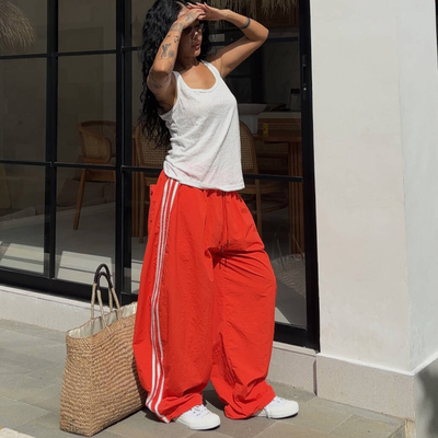 镰刀裤女薄款侧面三条杠百搭宽松橘红色松紧腰弯刀长裤高腰欧美风