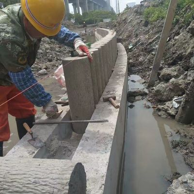 直径20-15厘米水泥仿木桩河道挡土仿木树桩