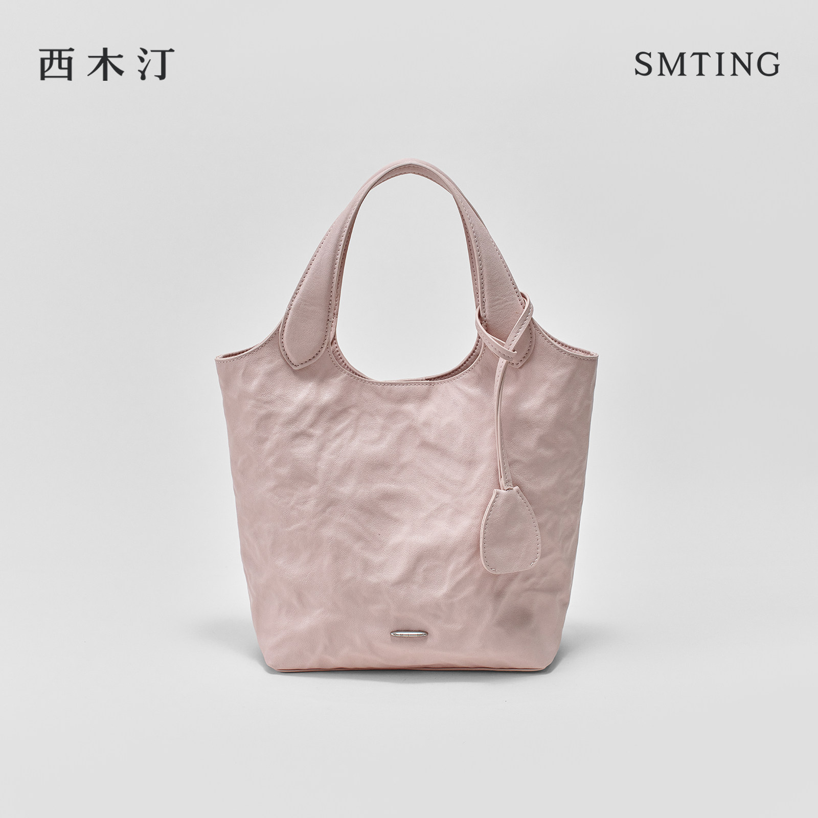 西木汀小情歌牛皮通勤水桶包