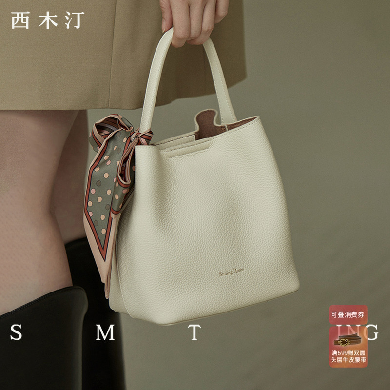 异乡人牛皮材质手提水桶包